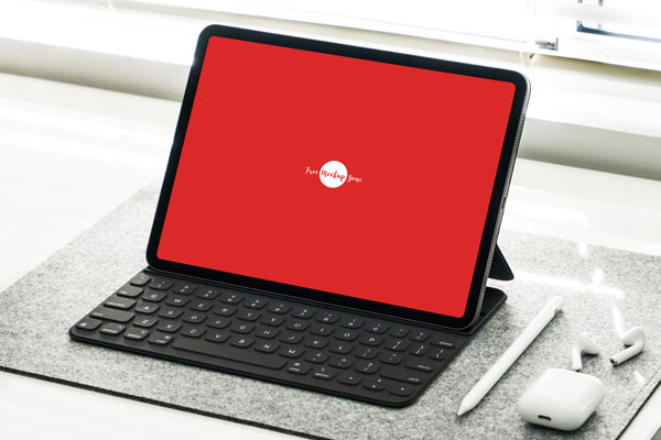 iPad Pro Placed on the Desk in Perspective Mockup FREE PSD
