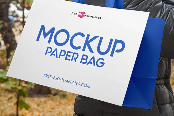 Three Paper Bag with Handle Mockups with an Outdoors Background FREE PSD