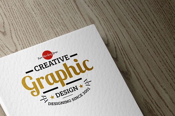 Top View Paper Textured Logo on a Wooden Surface Mockup FREE PSD