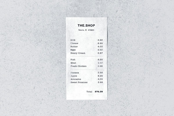 Store Receipt on a Concrete Surface From a Top View Mockup FREE PSD