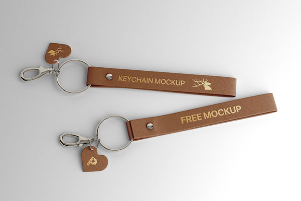 2 Leather Keyrings Laid on the Surface in Top View Mockup FREE PSD