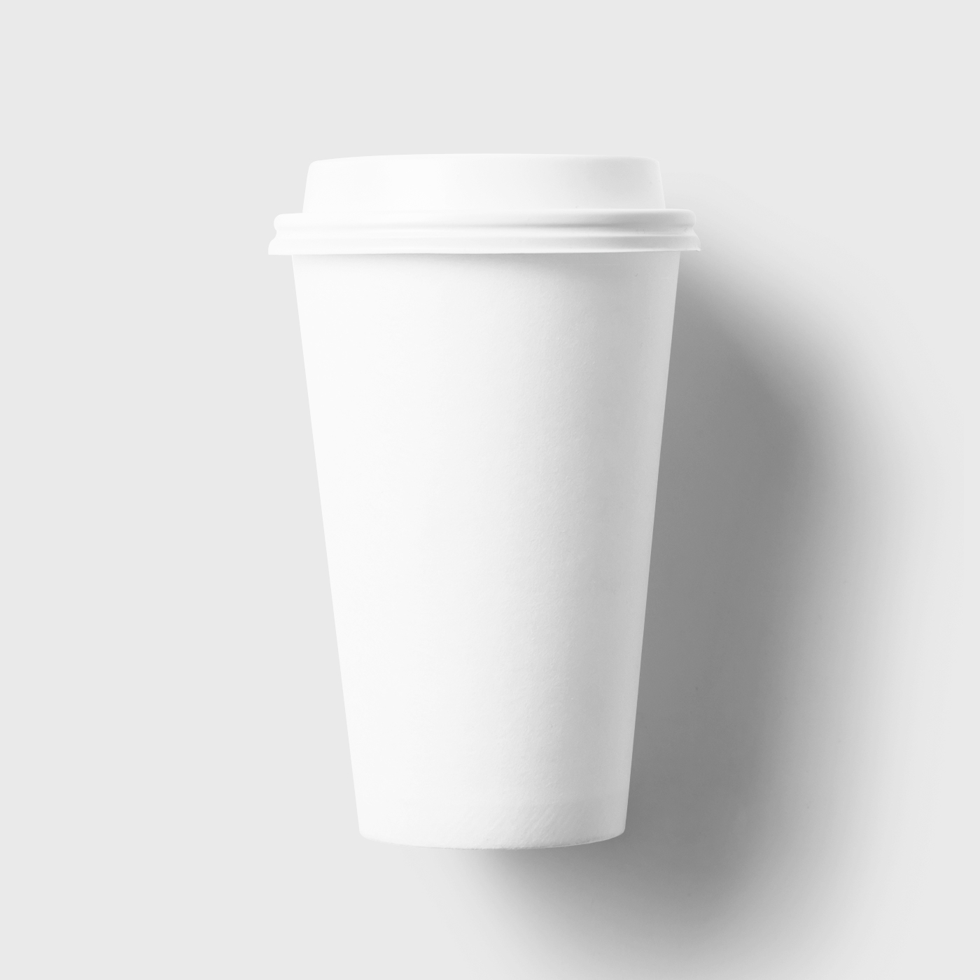 Front View of a Capped Paper Coffee Cup Mockup FREE PSD