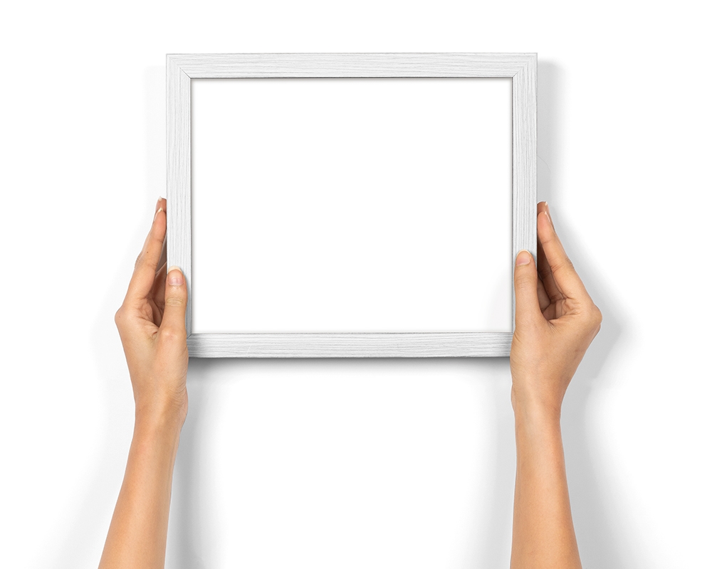 Front View of Hand Holding Photo Frame Mockup FREE PSD
