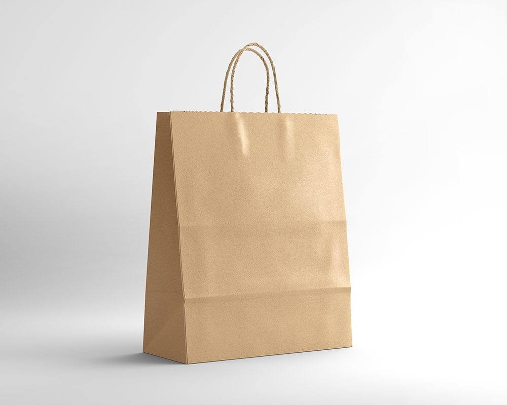 Kraft Paper Shopping Bag Placed in Plain Scene in Half-side View Mockup FREE PSD