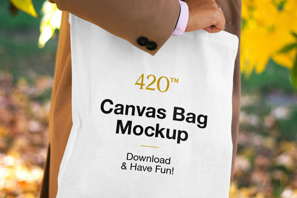 Mockup Features a Woman Holding the Canvas Bag FREE PSD