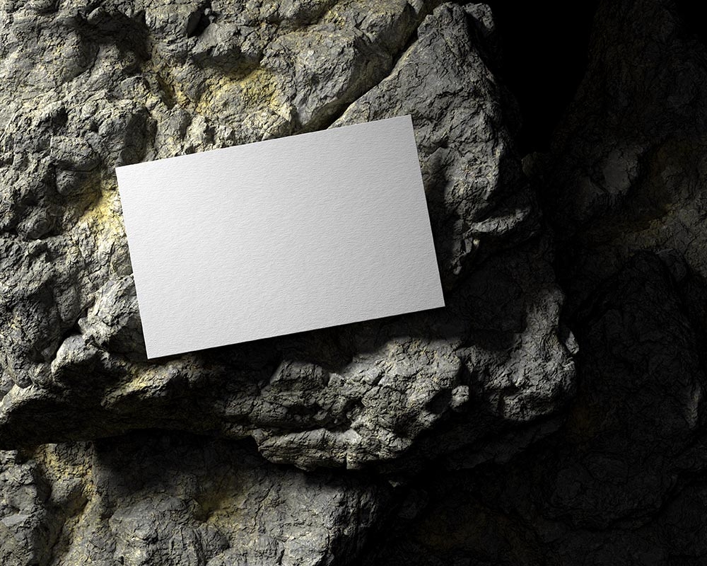 Top View of a Business Card on a Rock Mockup FREE PSD