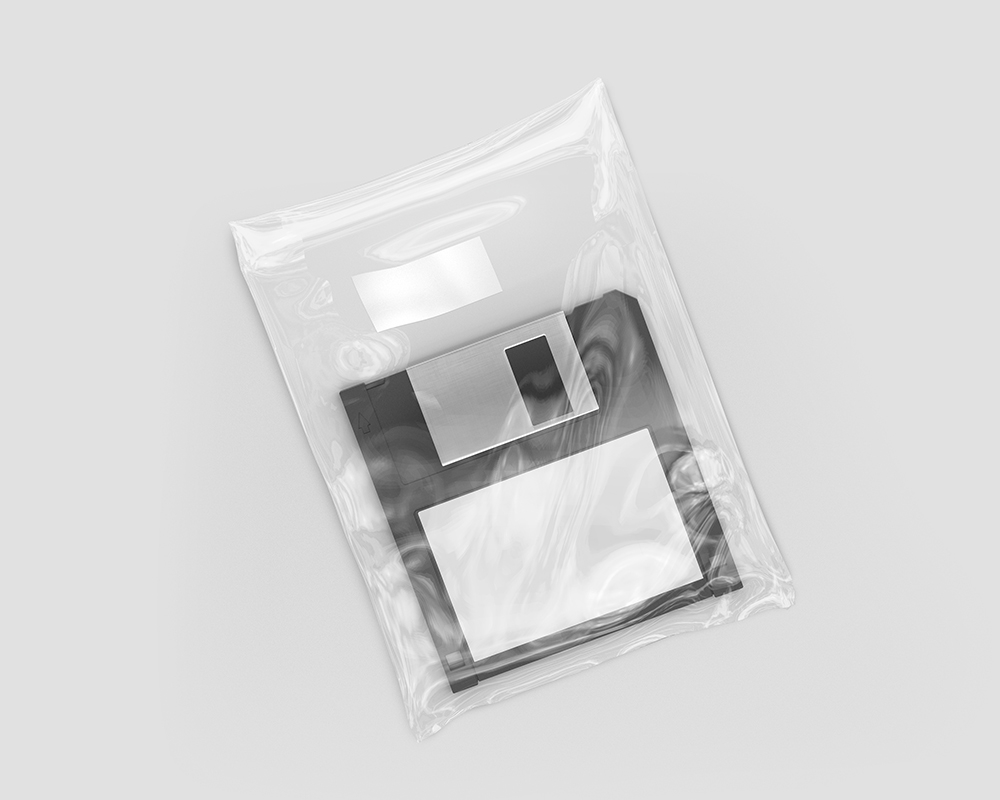 Top View of a Floppy Disk in a Clear Plastic Wrap Mockup FREE PSD