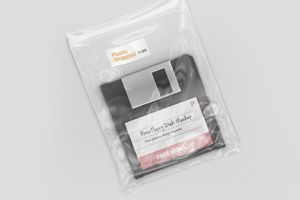 Top View of a Floppy Disk in a Clear Plastic Wrap Mockup FREE PSD