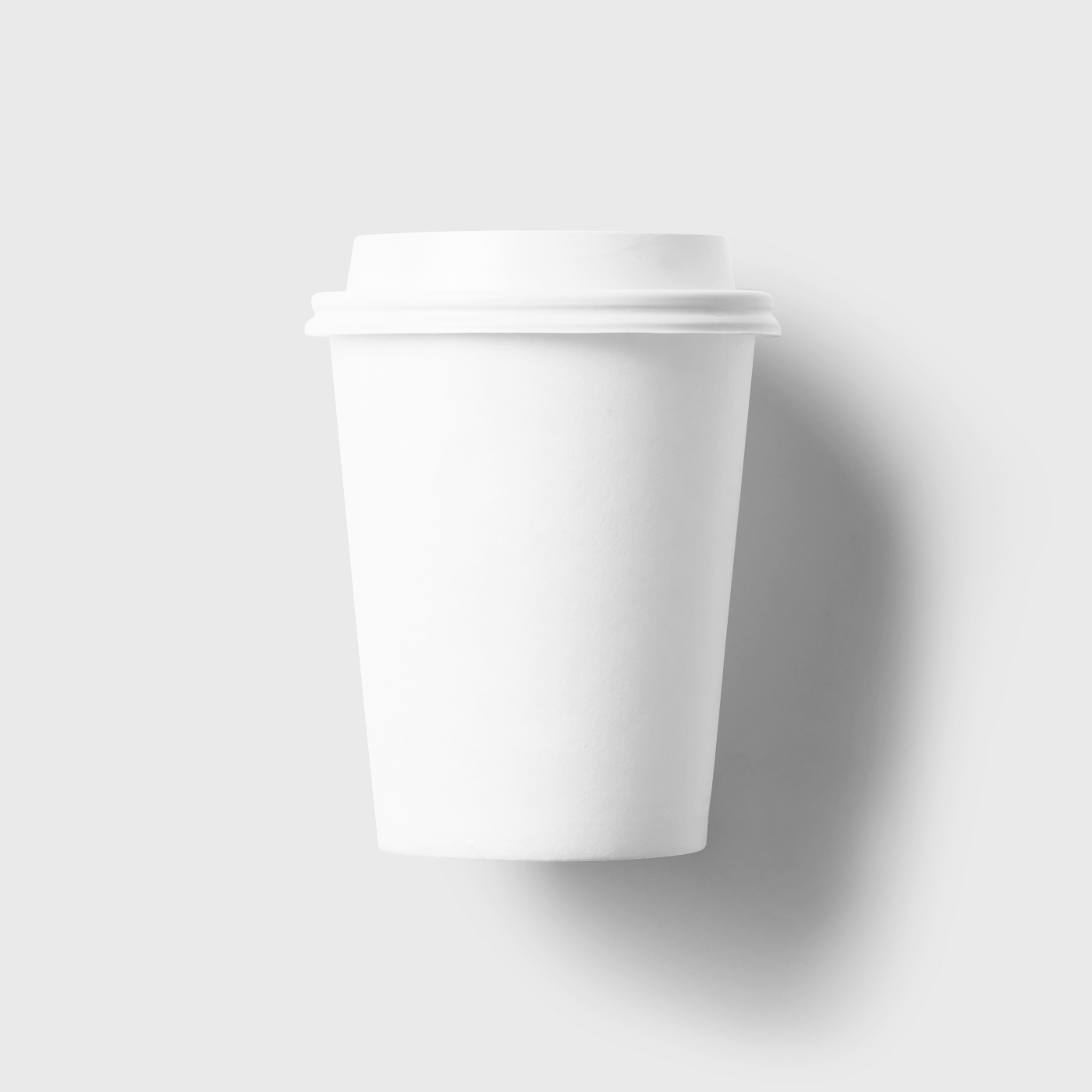 Top View of a Lidded Paper Coffee Cup Mockup FREE PSD