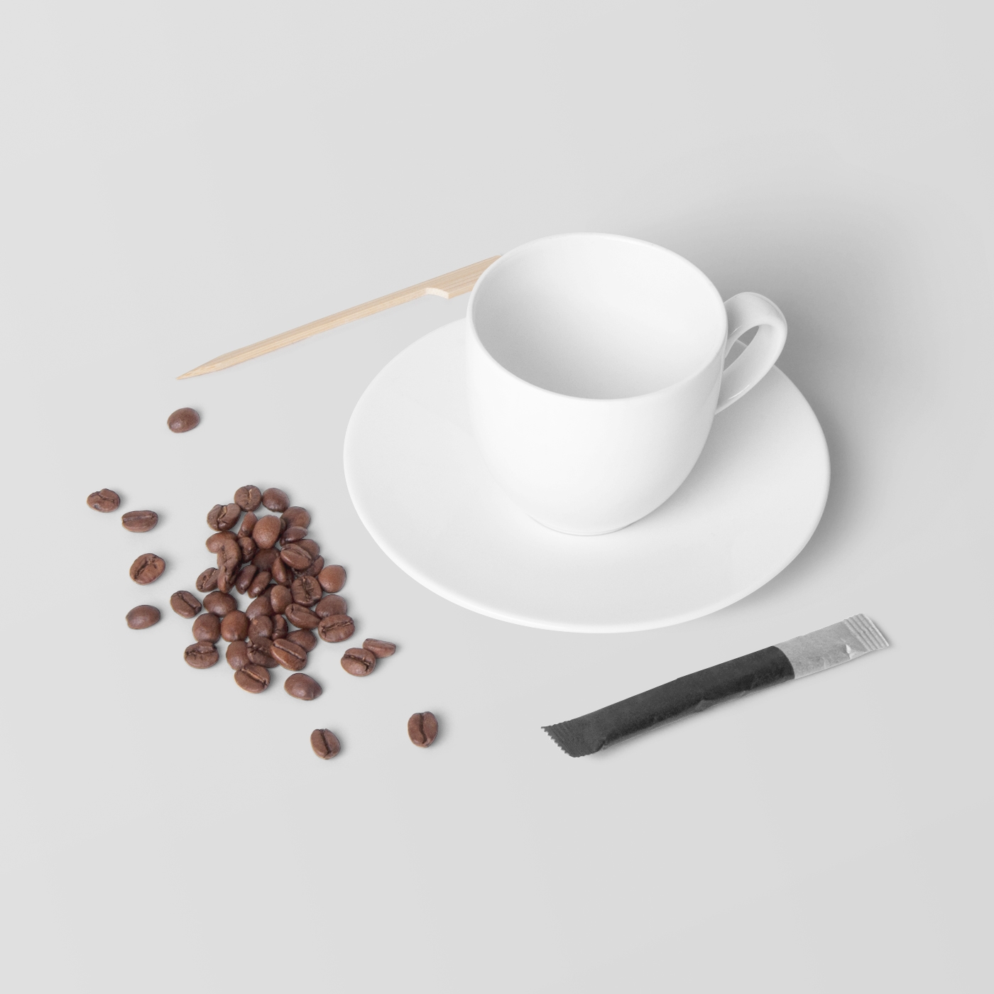 Top View of Coffee Cup Mockup Featuring Spread Coffee Beans FREE PSD