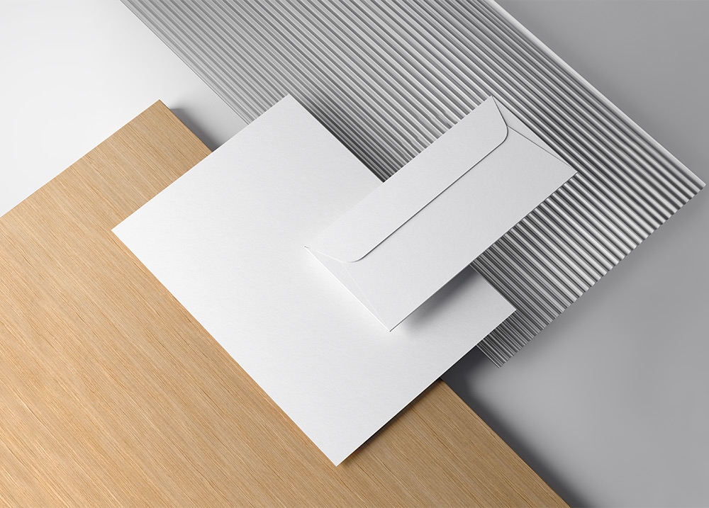 Branding Mockup Featuring A4 Letterhead and Envelope in Perspective FREE PSD