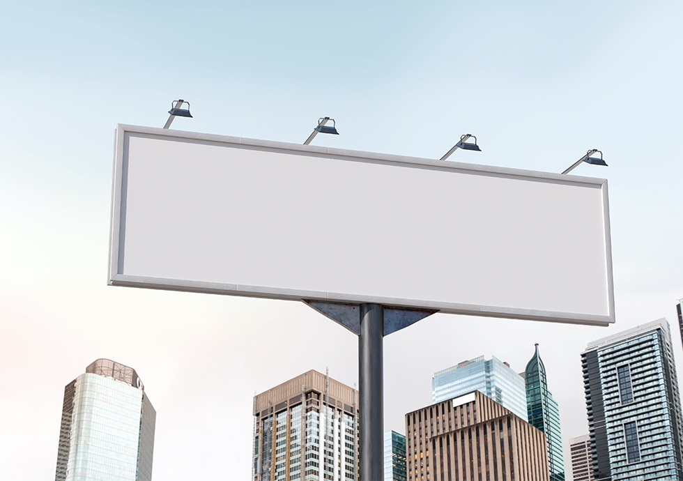 Low-angle Shot Horizontal Billboard Mockup Featuring City Buildings in the Background FREE PSD