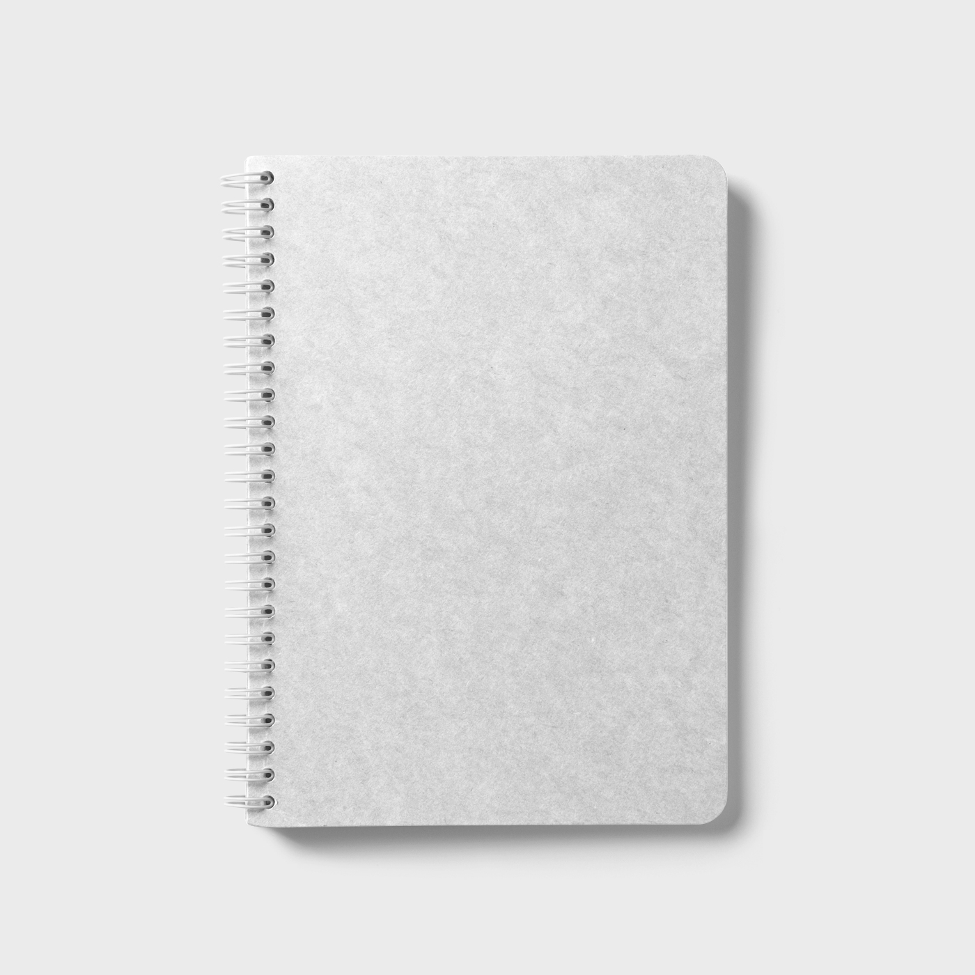 Top View of a Closed Wiry Notebook Mockup FREE PSD