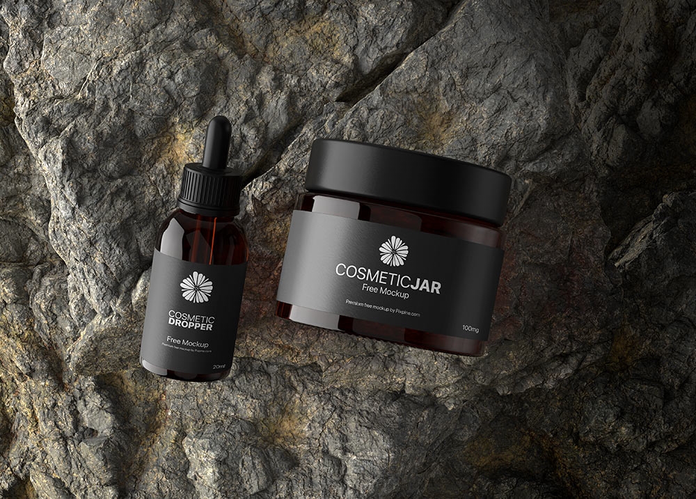 Top View of a Cosmetic Jar and Dropper on a Rock Mockup FREE PSD