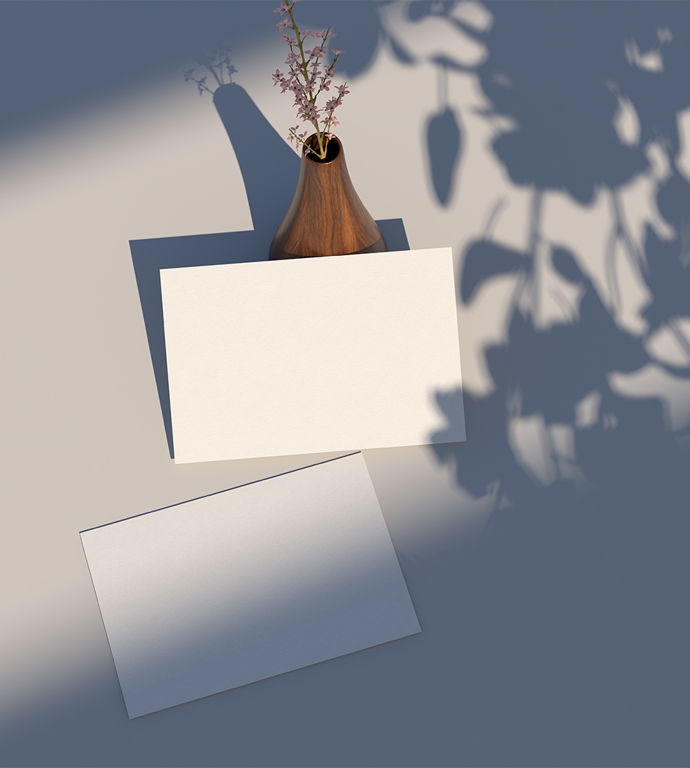 Top View of Postcard Mockup Against the Rustic Vase FREE PSD