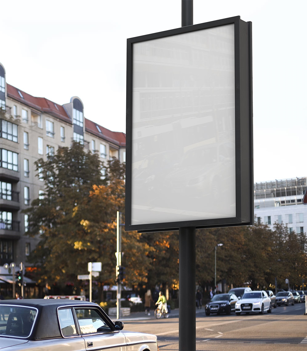 Vertical Lightbox Signboard on the Sidewalk at 3\4 Angle View Mockup FREE PSD