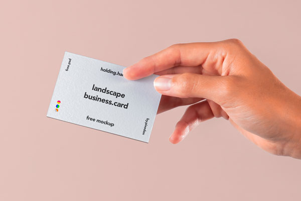 Front View of Hand Holding Business Card Mockup FREE PSD