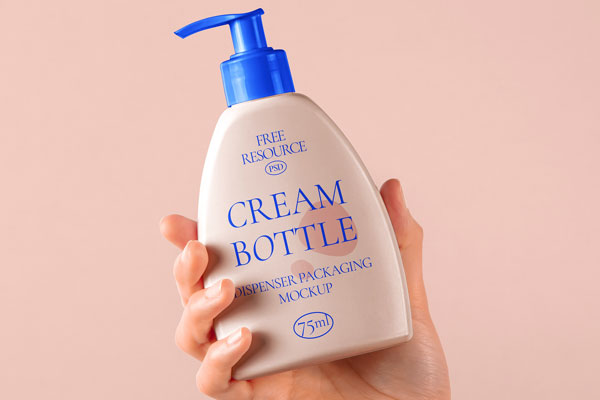 Front View of Hand Holding Cosmetic Bottle Mockup FREE PSD