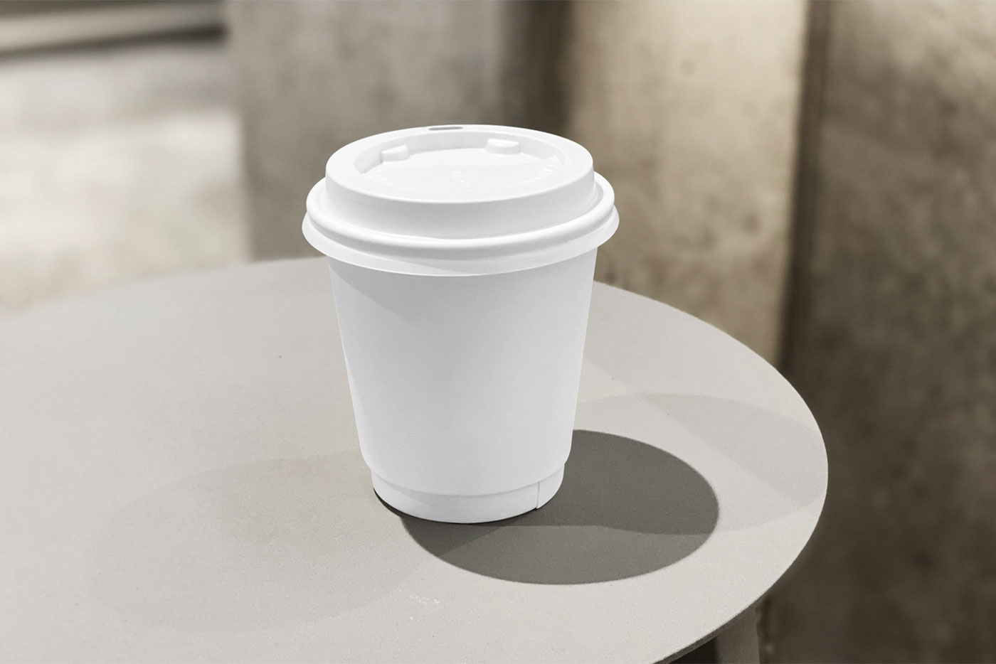 Front View of Small Coffee Cup Mockup on Table FREE PSD