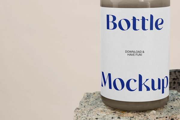 Front View of Rounded Bottle Mockup on Stone FREE PSD