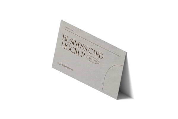Perspective View of Business Card Mockup Against Wall FREE PSD