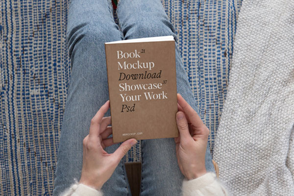 Top View of a Woman Holding Book Cover Mockup FREE PSD