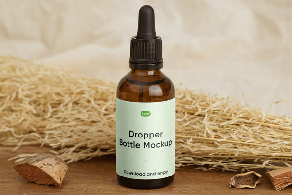 Front View of Dropper Bottle Mockup on Wood FREE PSD