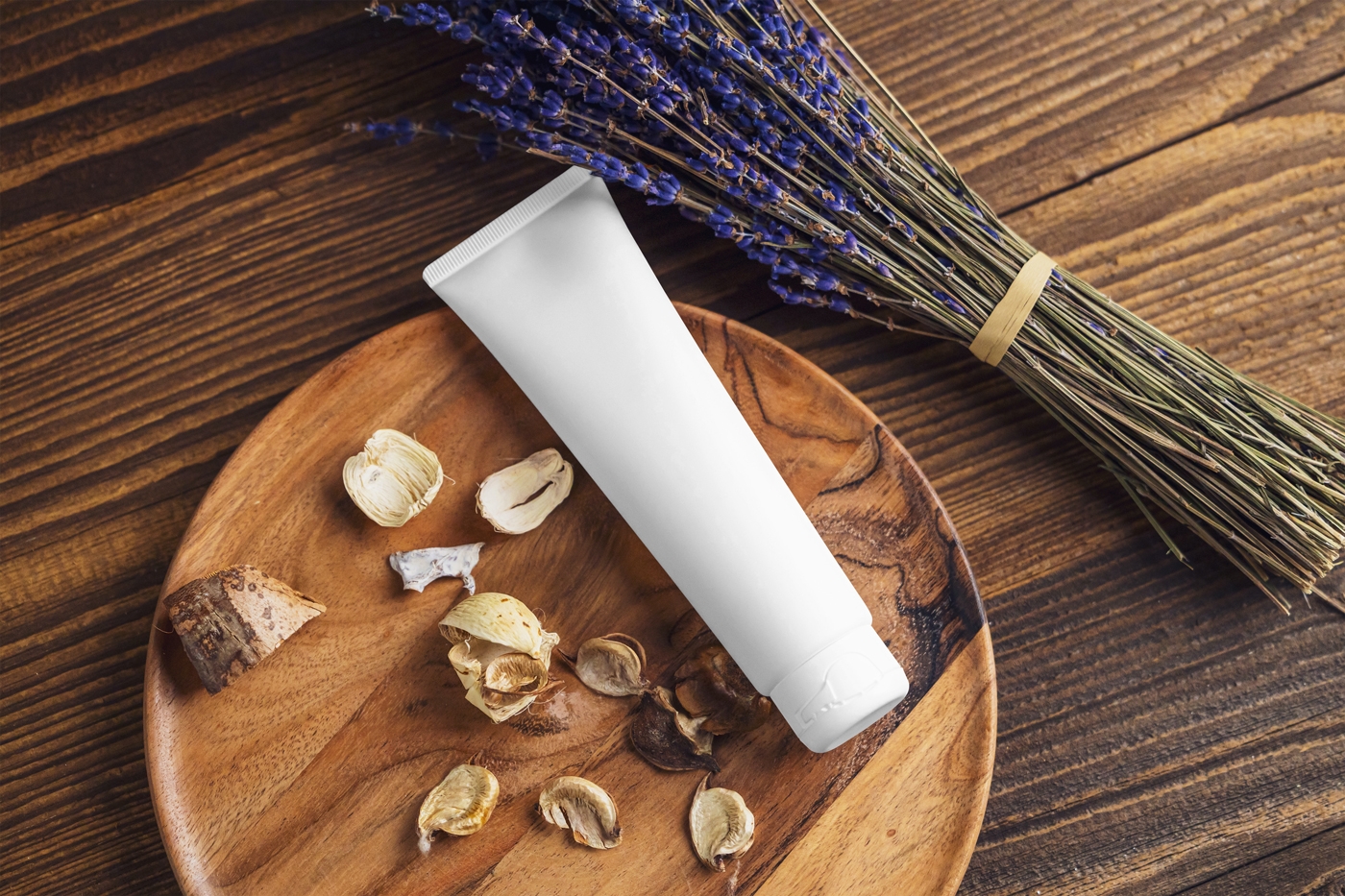 Trendy Cosmetic Tube Mockup Featuring Rustic Surface and Lavender FREE PSD