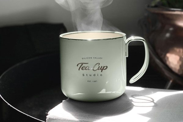 Front View of Ceramic Tea Cup Mockup on Table FREE PSD