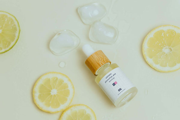 Top View of an Essential Oil Dropper Bottle Mockup FREE PSD