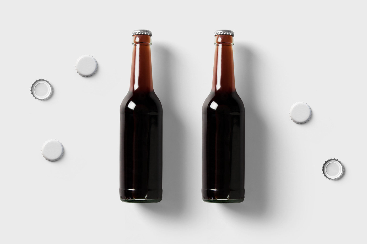 2 Glass Bottles Mockup with Caps in Front Sight FREE PSD