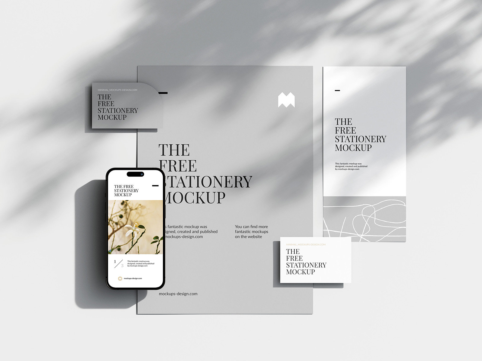 5 Shots of Mobile Mockup and Stationery with Natural Shadows FREE PSD