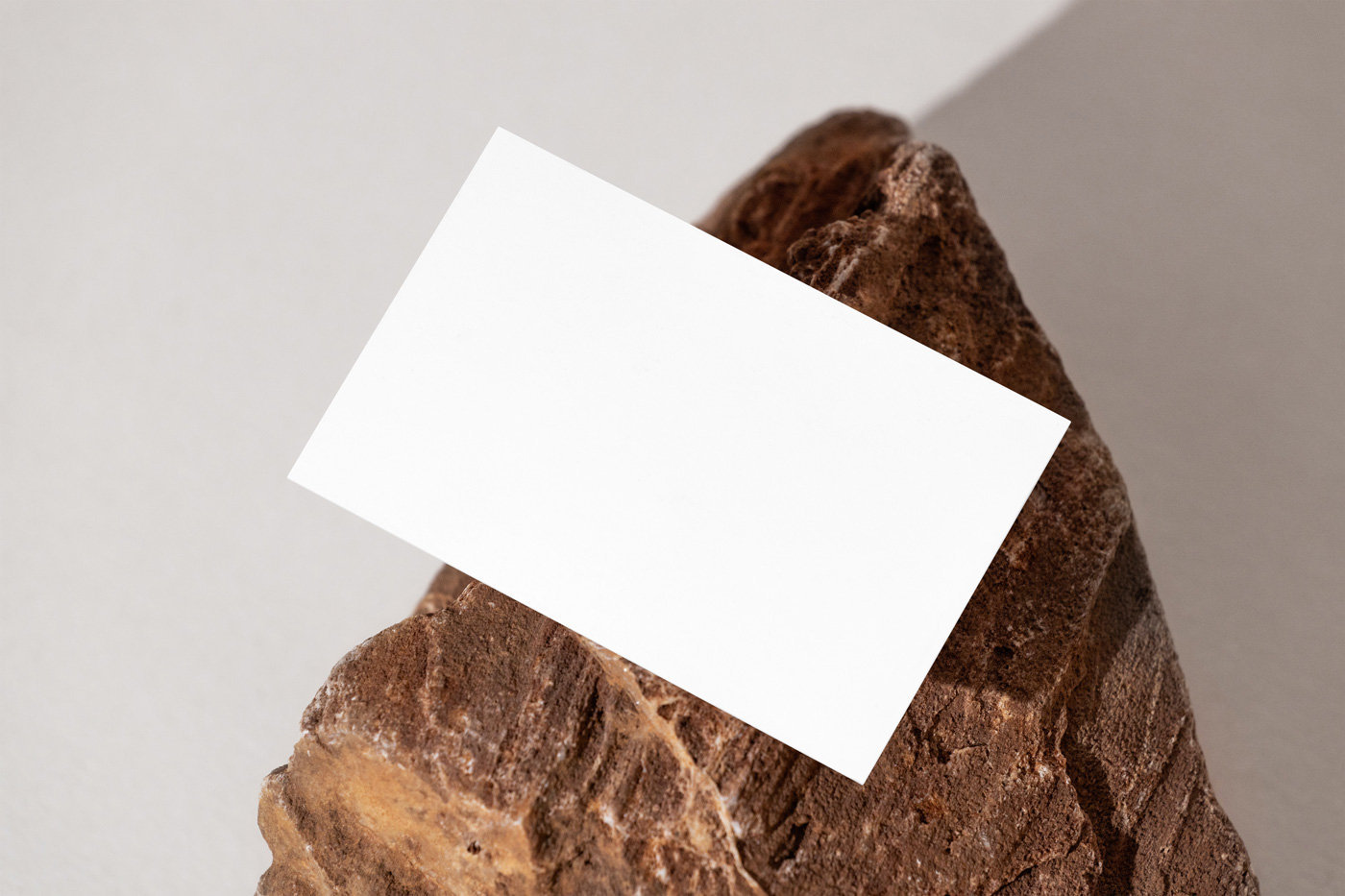 Business Card Mockup with Stone in Perspective Sight FREE PSD