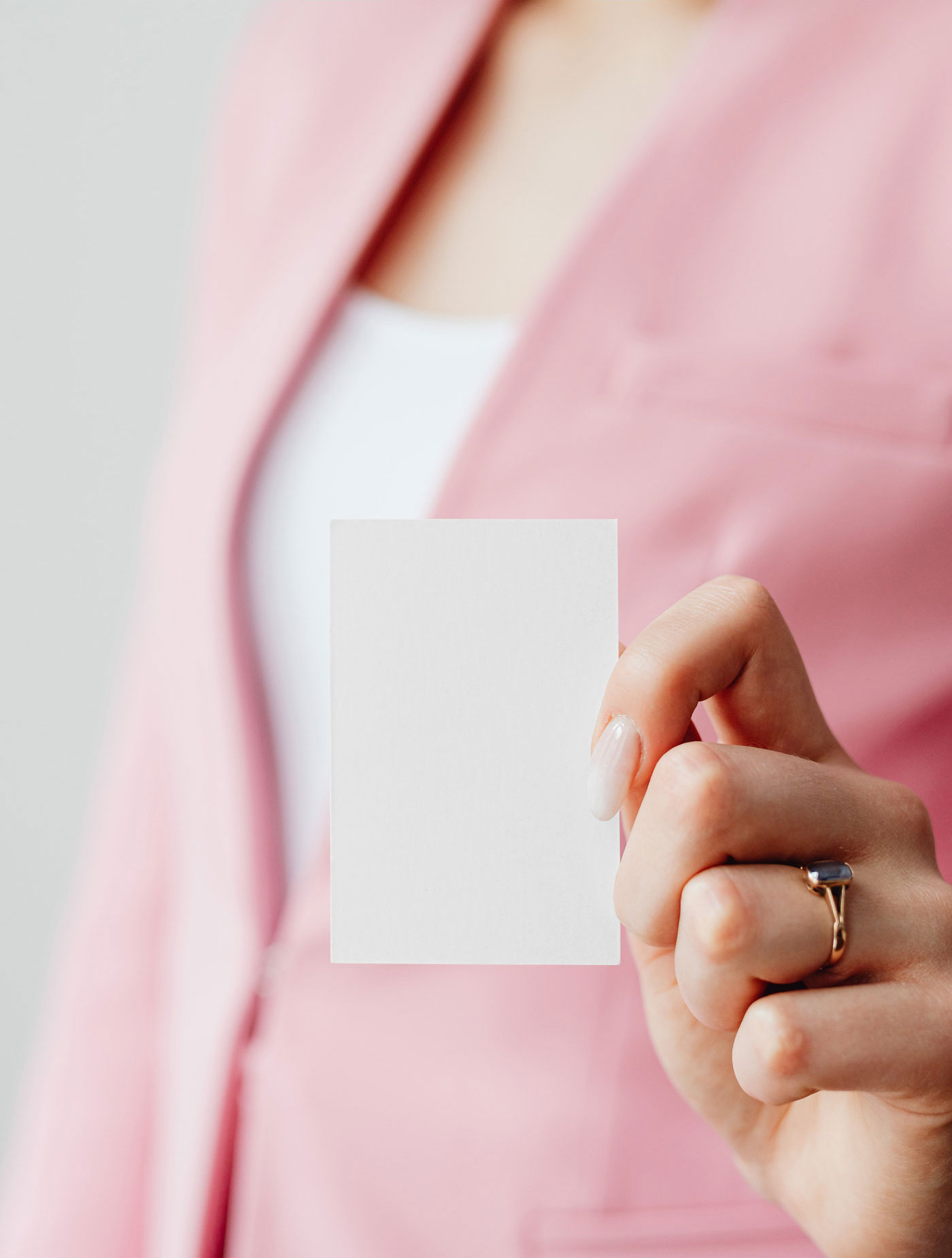 Front View of Business Card Mockup in a Lady's Hand FREE PSD