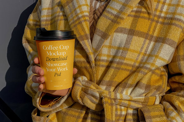 Front View of Hand Holding Coffee Cup Mockup FREE PSD