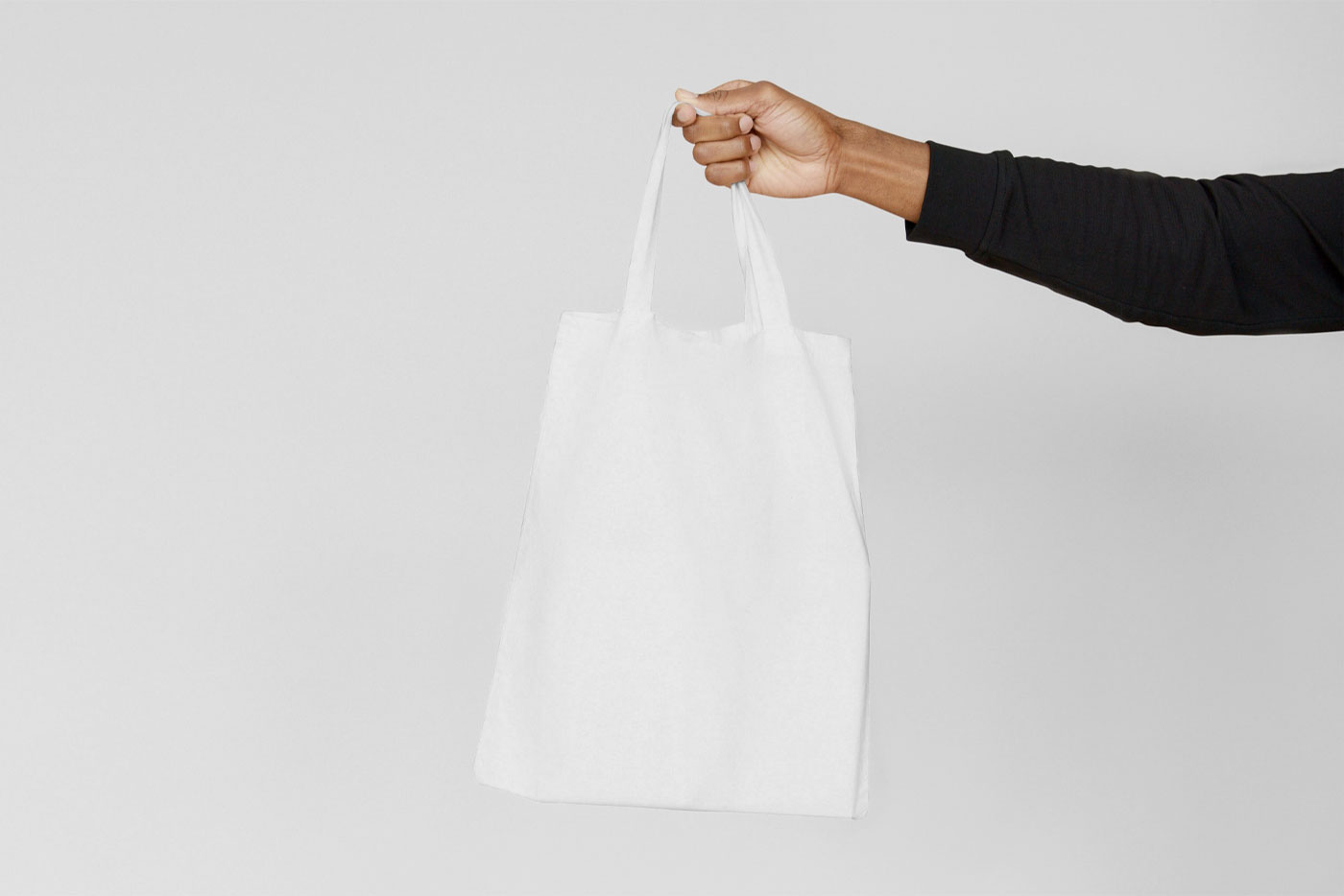 Handholding Canvas Bag Mockup from Front View FREE PSD