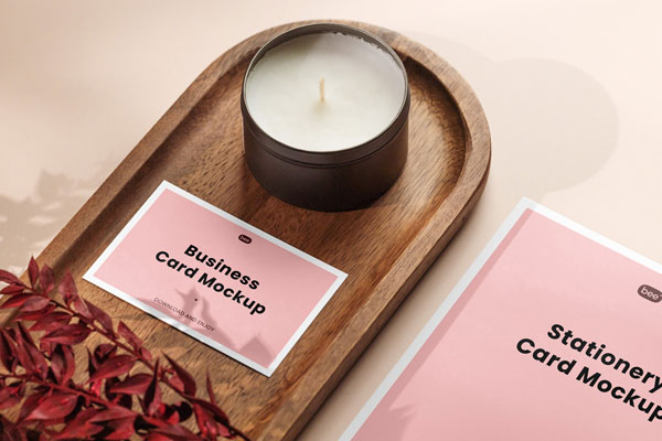 Perspective View of Business Card Mockup with Small Candle FREE PSD