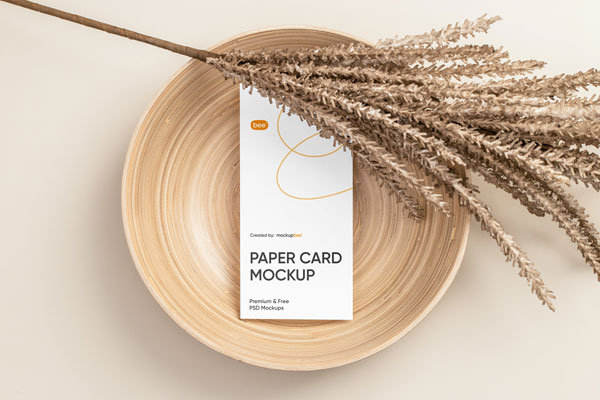 Top View of Modern Vertical Paper Card Mockup on Plate FREE PSD