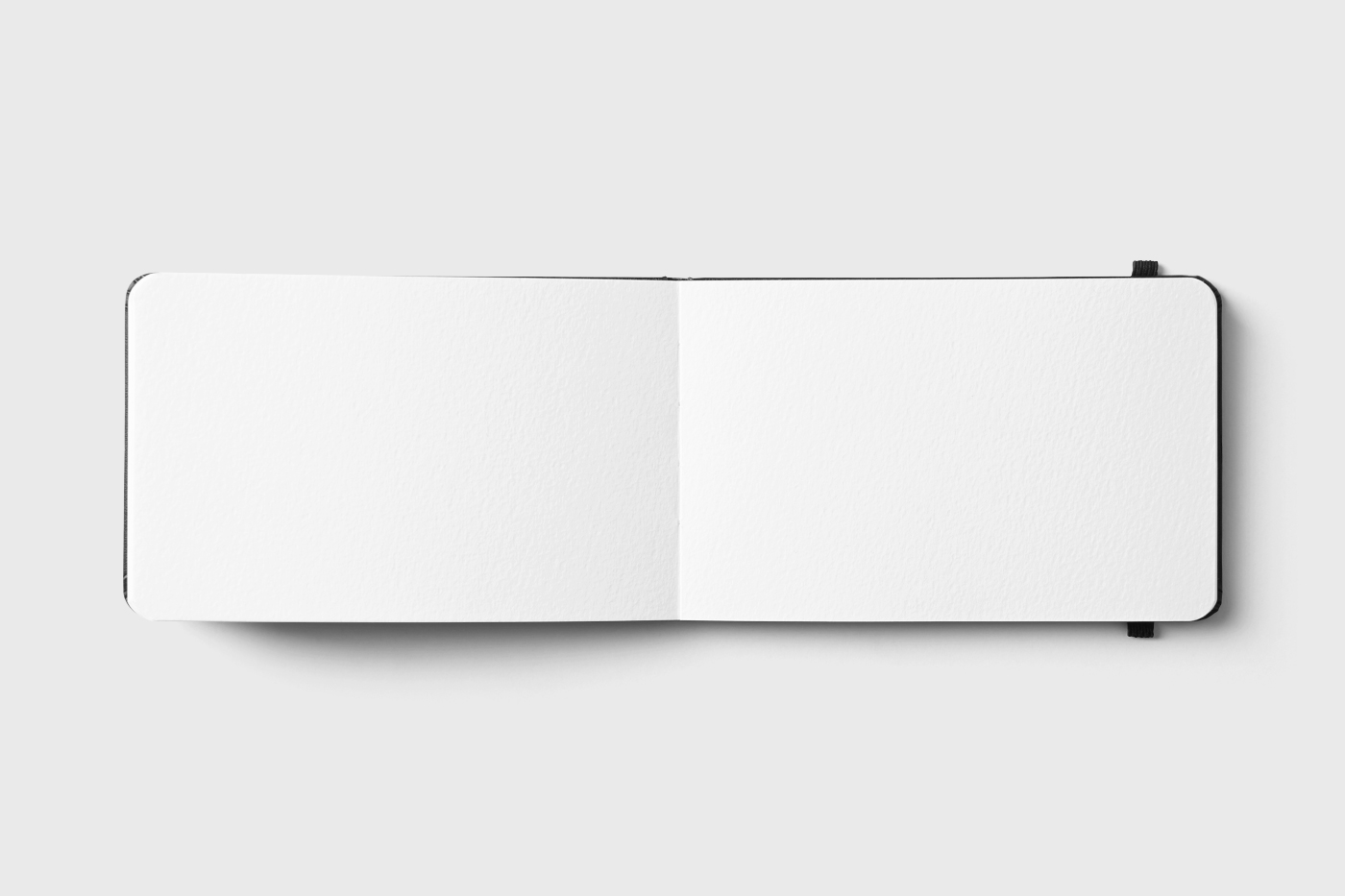 Top View of Open Notebook Mockup with Rubber FREE PSD