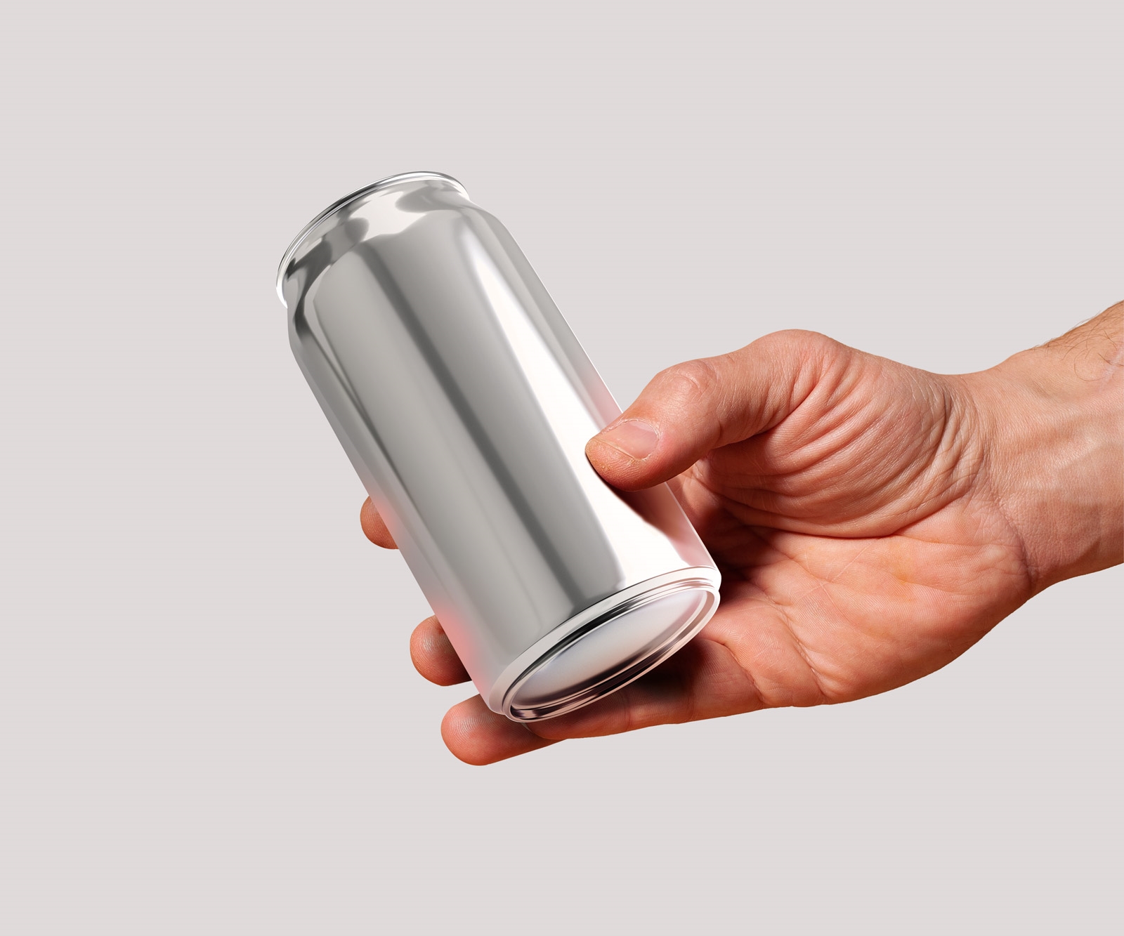 Front View of a Hand Holding Soda Can Mockup FREE PSD