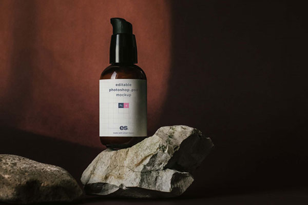 Front View of Mini Foam Pump Bottle Mockup above Real Rocks FREE PSD