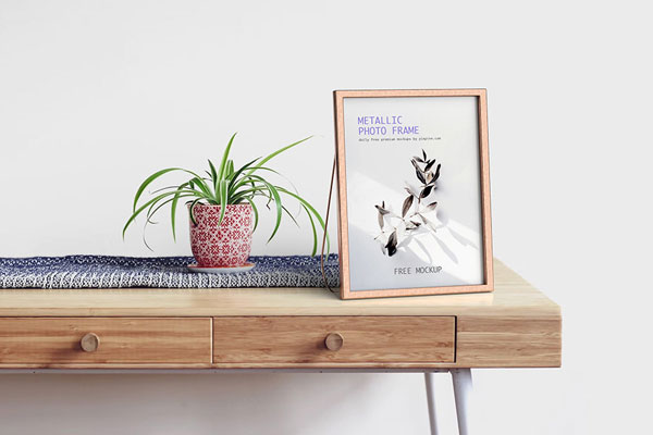 Metallic Photo Frame Mockup on Wooden Table FREE PSD