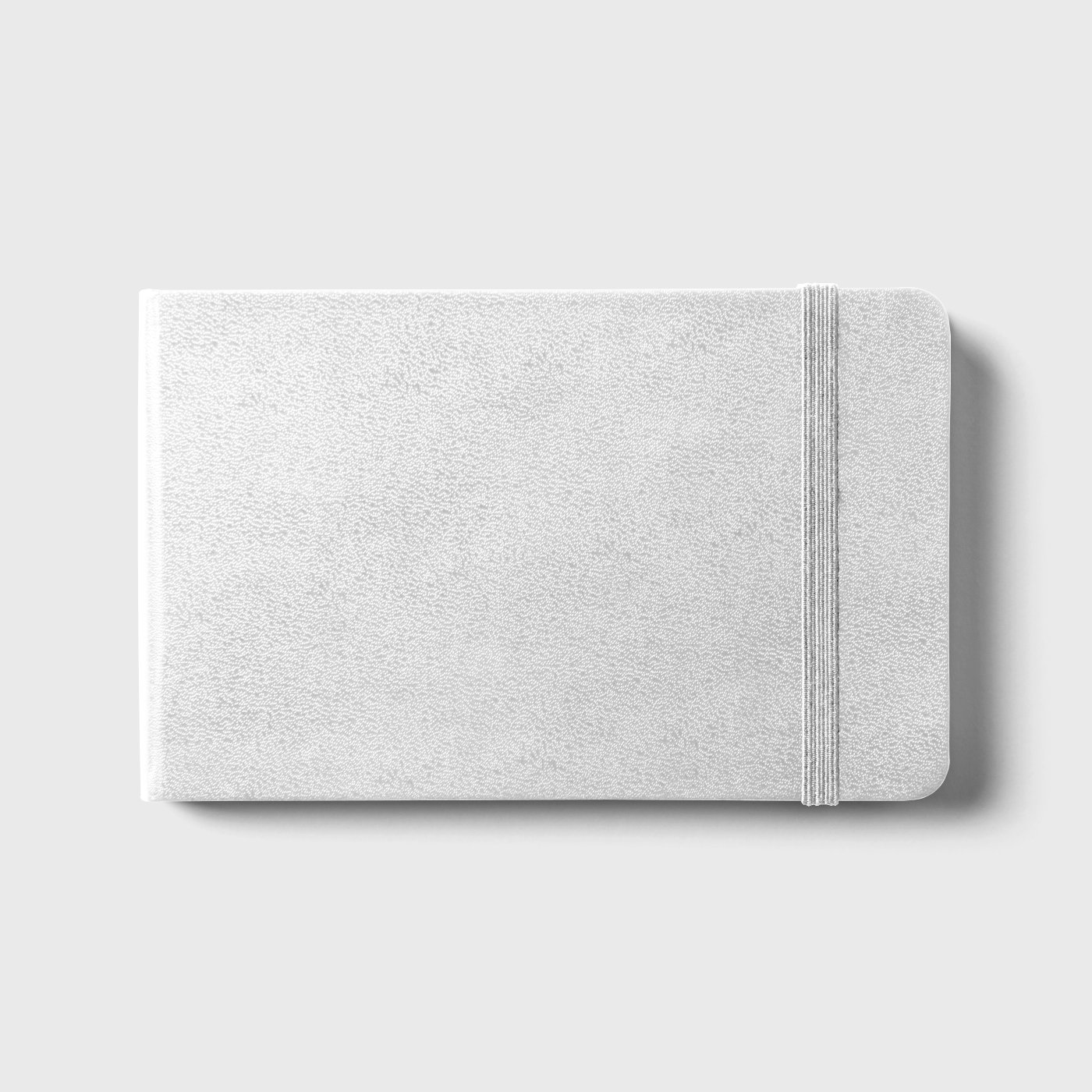 Top View of Rubber Band Clad Notebook Mockup FREE PSD