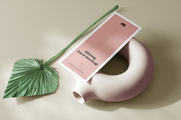 Top View of Simple Oblong Card Mockup on Vase FREE PSD