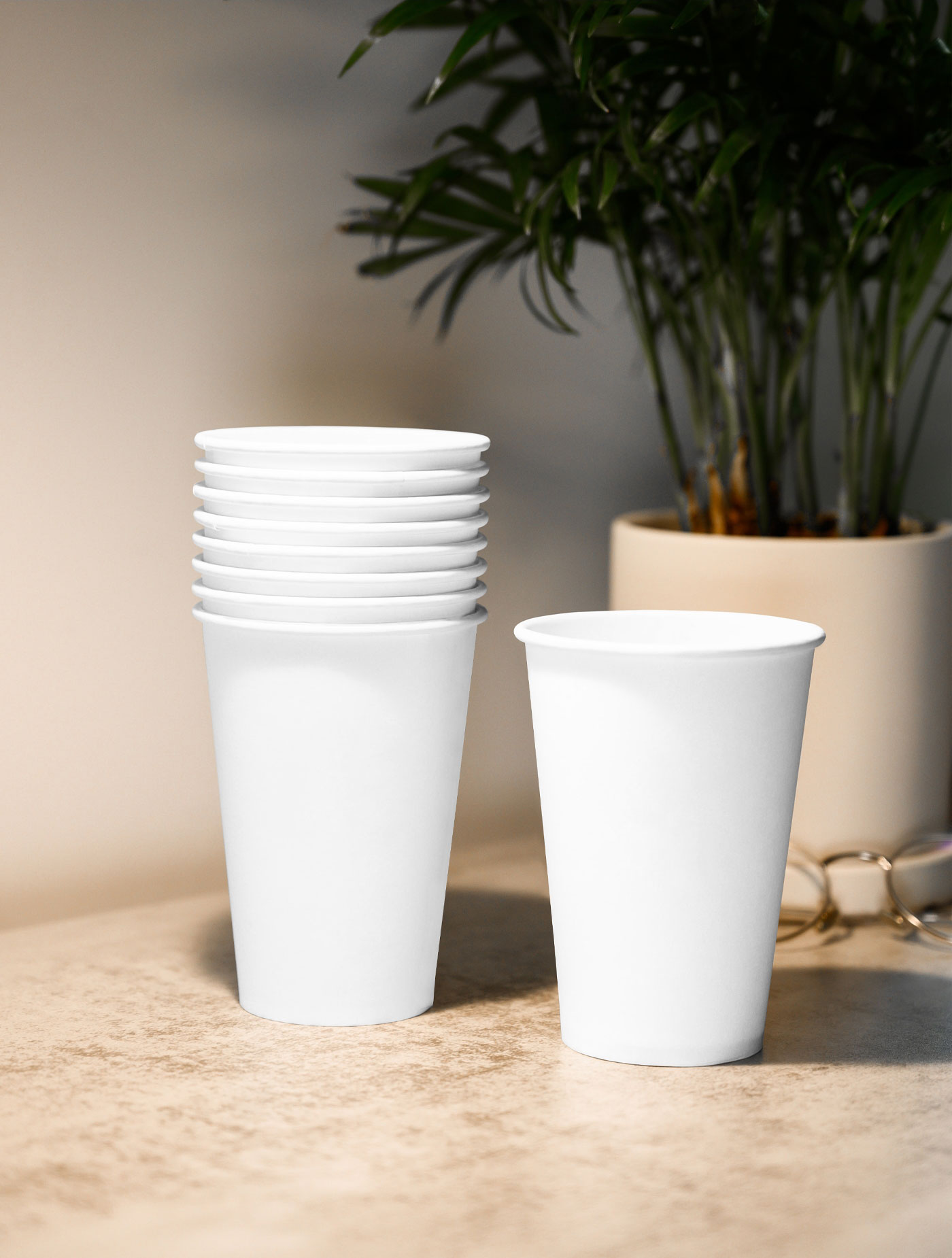 Front View of Realistic Paper Cups Mockup on Table FREE PSD