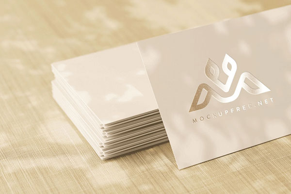 Perspective View of Animated Logo Mockup on a Stack of Cards FREE PSD
