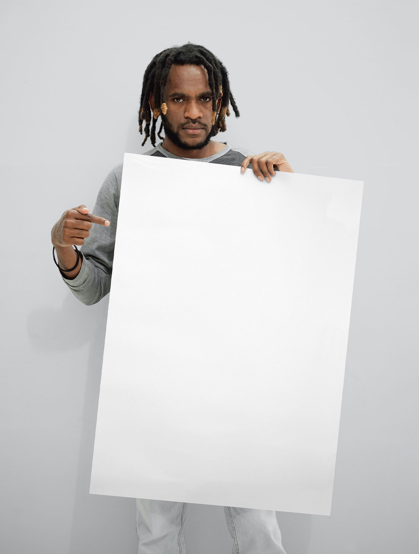Front View of Man Holding Huge Poster Mockup FREE PSD