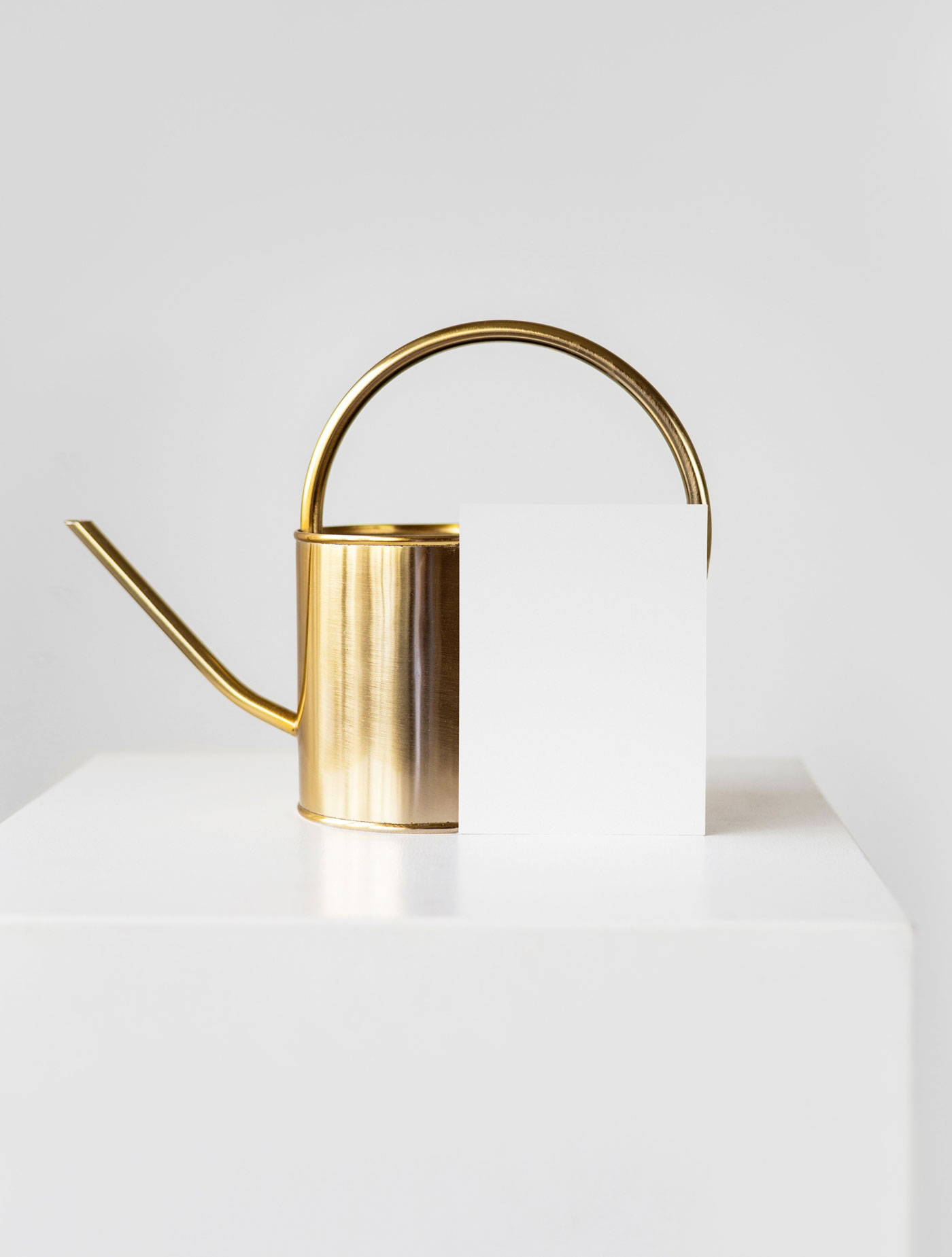 Neat Rectangular Card Mockup Against Golden Watering Can FREE PSD