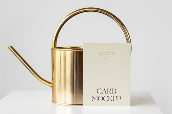 Neat Rectangular Card Mockup Against Golden Watering Can FREE PSD