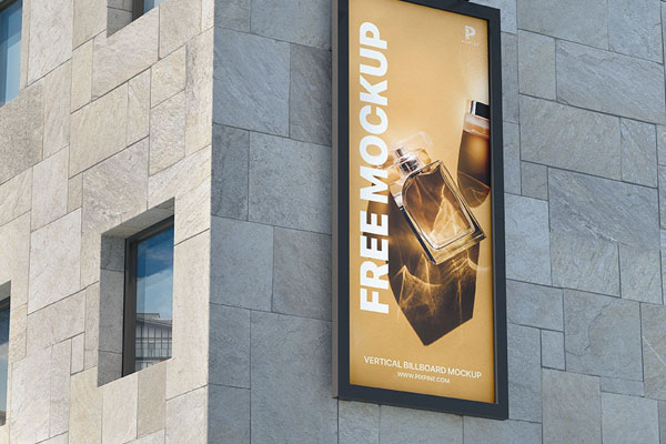 Perspective View of Outdoor Vertical Billboard Mockup on Building FREE PSD